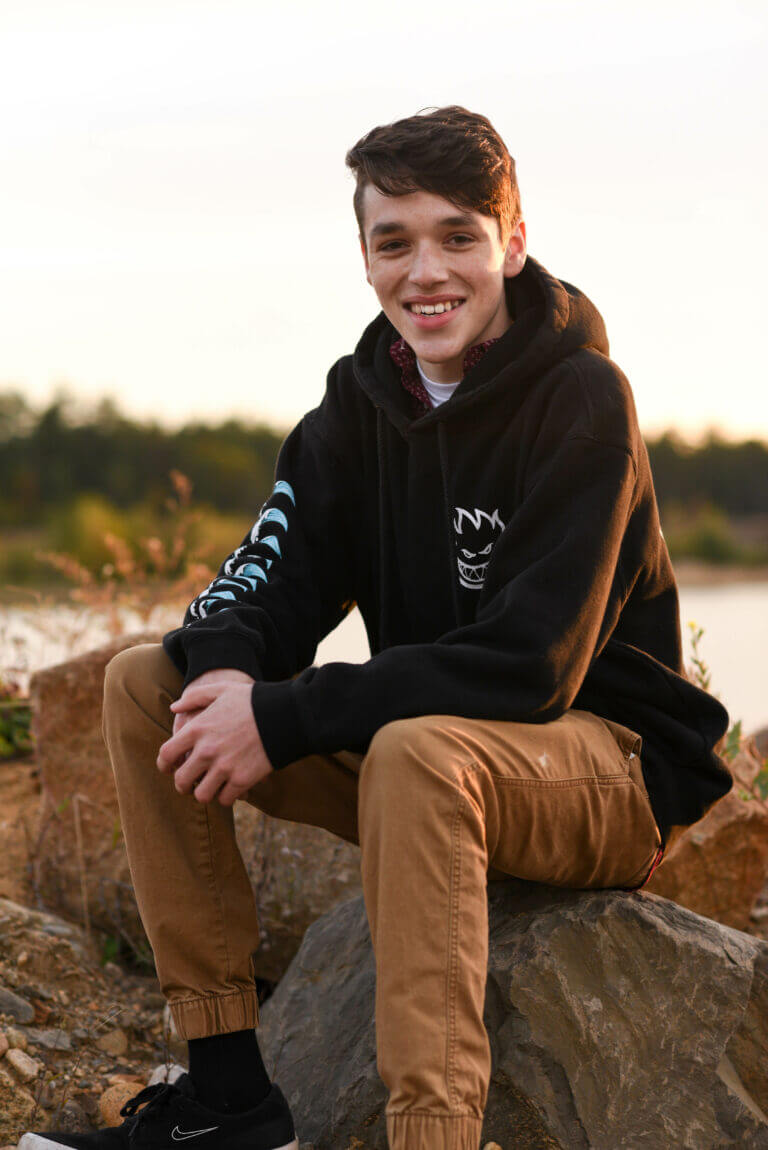 Trent posing on a rock